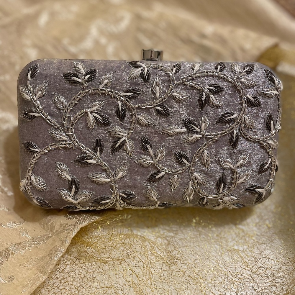 Silver embellished clutch